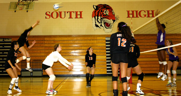 Captain Ellen Sachs delivers a back row attack during a game against Southwest.  Photo Credit: Erika Roedl