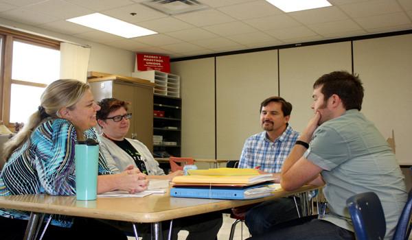 Social Studies teachers Robert Panning-Miller, Joshua Fisher, and English teachers Michelle Ockman and Mary Manor are the new Open Coordinators