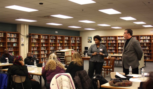Associate Superintendent Steve Flisk and Interim Director of Talent Acquisition Miquel McMoore answer questions from South parents at a PUSH meeting December 9.