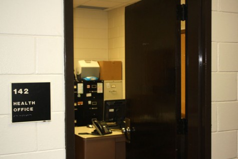 The health office is tucked in the back corner of the school on the first floor, across from the dean's offices.