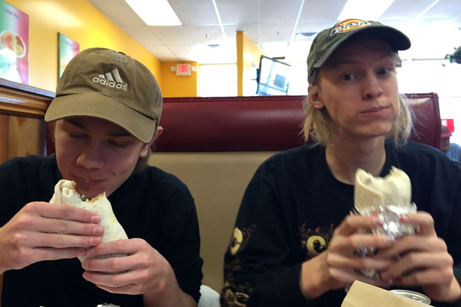 Cyrus Nordhaugen and Cooper Cooper enjoy a delicious tiger burrito at Pineda