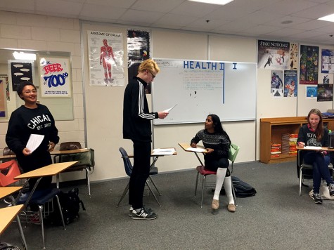 Peer Education students practice skit meant to educate students about the In-school clinic. These will be performed in underclassmen classrooms around South. Having the skits and presentation performed by other students makes the topic “less scary” explained Sophomore Makena Froebel. Names from Left to right: Eli Shamanski and Bela Toscani.