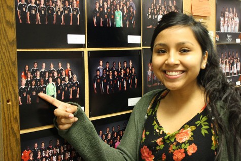 Senior Harmony Chino points to her soccer photo. Unlike most varsity players, Chino started playing soccer freshman year. She is part of the AVID program and balances school, friends and sports gracefully. 