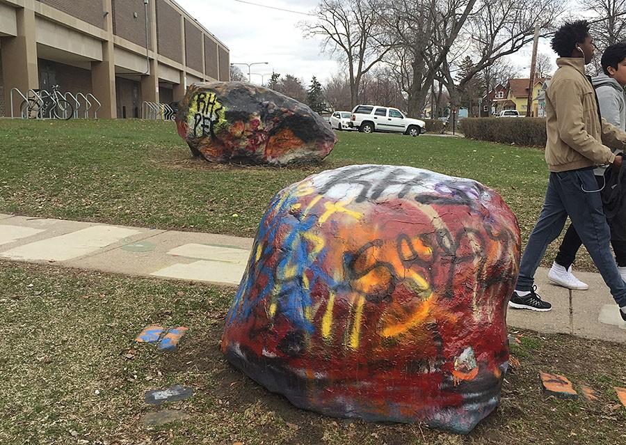 The rock outside of South, coated with layers and layer representing decades of sports rivalries. Photo: Eva Shellaberger