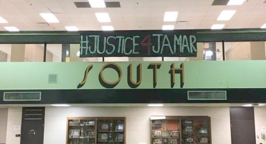 A banner for #JusticeforJamar hangs in the South High Commons. Students organized a sit-in on April 5th to respond to the non-indictment of Minneapolis police officers Mark Ringgenberg and Dustin Schwarze, who killed Jamar Clark. 