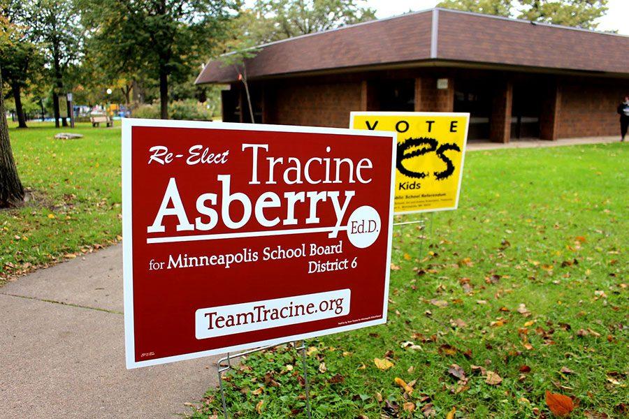 Signs set up by Tracine Asberry while campaigning in Linden Hills Park.