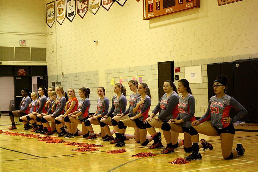 South High Varsity Volleyball taking a knee at their game against Edison in solidarity with the Black Lives Matter movement. They first took a knee at their game against Washburn on September 15 and have done it at every game since.