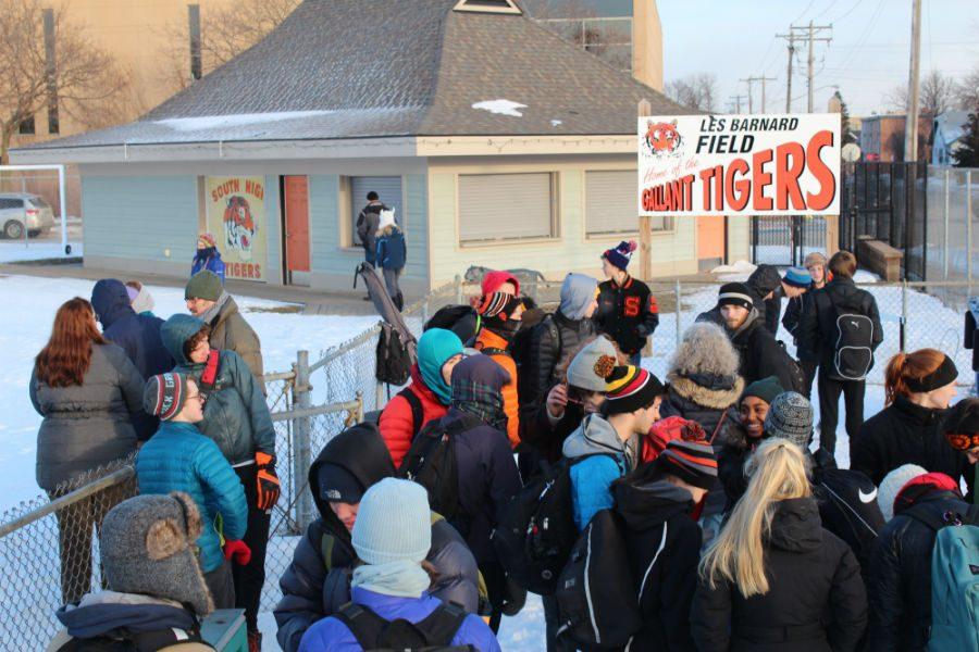 It may have been below zero, but these South High students, coaches, parents, staff, and alumni braved the cold to show not only their want, but need for a new athletic field. Bundling up, Hot Chocolate, and a sense of school pride kept everyone on the field nice and toasty.
Photo: Izzy Willette