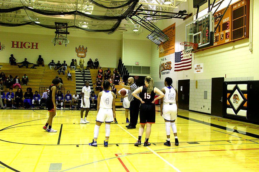 Pictured+above+junior+Morgan+Hill%2C+along+with+senior+Rose+Lutz%2C+participate+in+a+free+throw+against+Minneapolis+North+Community+school.+The+south+womens+basketball+team+won+the+game+68-58.%0APhoto%3A+Oliver+Hall