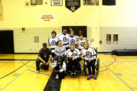 Pictured above: South’s adapted floor hockey team poses for a team photo after their massive win against South Suburban.  The team looks forward to making it to state this year which will take place on March 17th and 18th.  Seniors on the team include Hanna Bolstrom, Mark Runquist, Mohammed Mohammed, and Noah Novacek.
Photo: Henry Holcomb