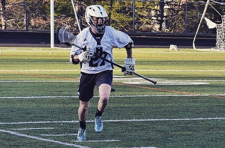 Pictured above senior Ben Neal plays lacrosse for the Minneapolis co-op high school team. Next year Neal will be a part of Chatham Universitys first ever Mens lacrosse team. Photo courtesy of: Mike Lieb