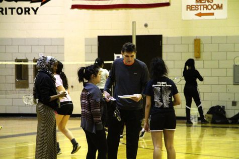  Pictured above Rodney Lossow coaches, and gives instructions to the badminton team. Lossow is a former assistant coach that has taken up the mantle of head coach for the football team and continues to coach the badminton team. He has coached many different sports in Minneapolis. 
Photo: Eli Shimanski