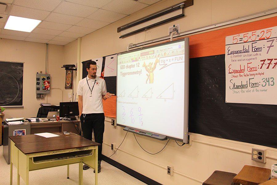  Karl Griffin teaching trigonometry to his Honors Geometry class. Next year he will be teaching AP Computer Science Principles, a class that  is new to south and has students excited. “I cant wait because the teacher Mr. Griffin is actually letting us make our own projects and I have a lot of ideas of what Im going to be programing so Im quite excited,” said Junior Jennifer Njugo.