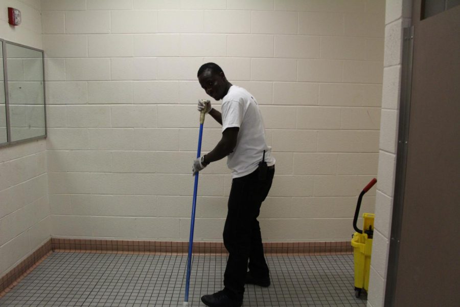 Pictured above Amuchin Dann is cleaning the third floor womens bathroom about an hour and a half after school. He is a night shift custodian who has worked at South for a few months. He has been treated well by students and staff and enjoys it here.
Photo: Oliver Hall
