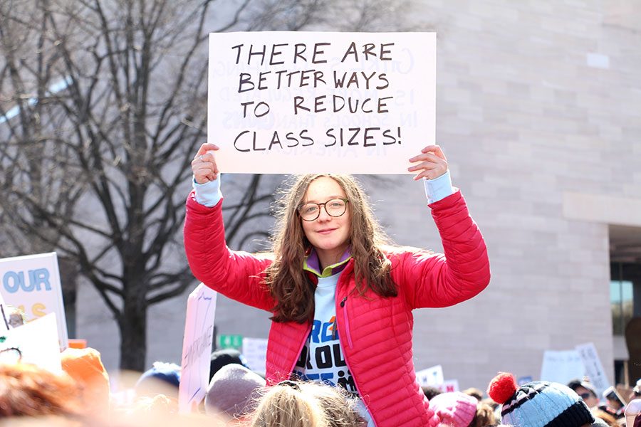 Washburn sophomore Solana Breen hold a sign at The March for Our Lives rally in Washington D.C. It was a catalyzing event for the gun control movement. “I’ve found that white activism has increased since various school shootings have occured, but it’s from people I didn’t see at the majority of the Black Lives Matter protests,” said junior Eiset Mebrahtu. “People are willing to advocate for something when it affects them but not when it affects someone else… which I see is deep seated in racism. It really questions what the core of the movement is about.” Photo: Henry Holcomb
