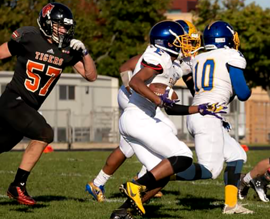 Pictured above, senior Michael Warner (57) playing defense at Souths homecoming game. Werner plays offensive and defensive line for the South varsity football team and just won the Stacy Robinson award. Photo: Spencer Kimball