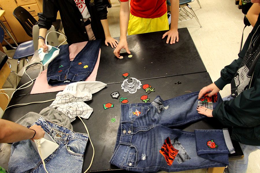 The new South Fashion Club is doing a DIY project on denim. The club sews patches on clothing. “Fashion is my way of expressing myself because Ive never gotten into art or anything like that so, fashion is my way of expressing my personality through my outfits,” said junior club Founder, Sonya Maier. Photo: Suad Adam 