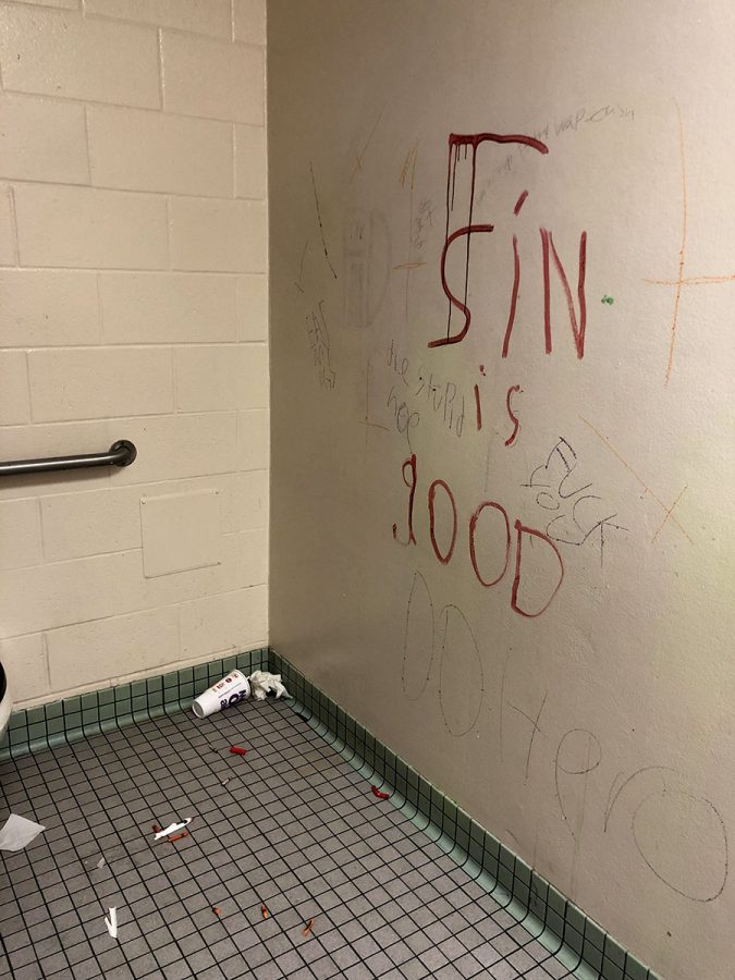 Graffiti like this has been a recurring event in bathrooms, classrooms and other areas around South this year, although custodial staff have continued to clean up the vandalism student and administration have struggled to maintain a positive relationship due to further policing of bathrooms and other school spaces.