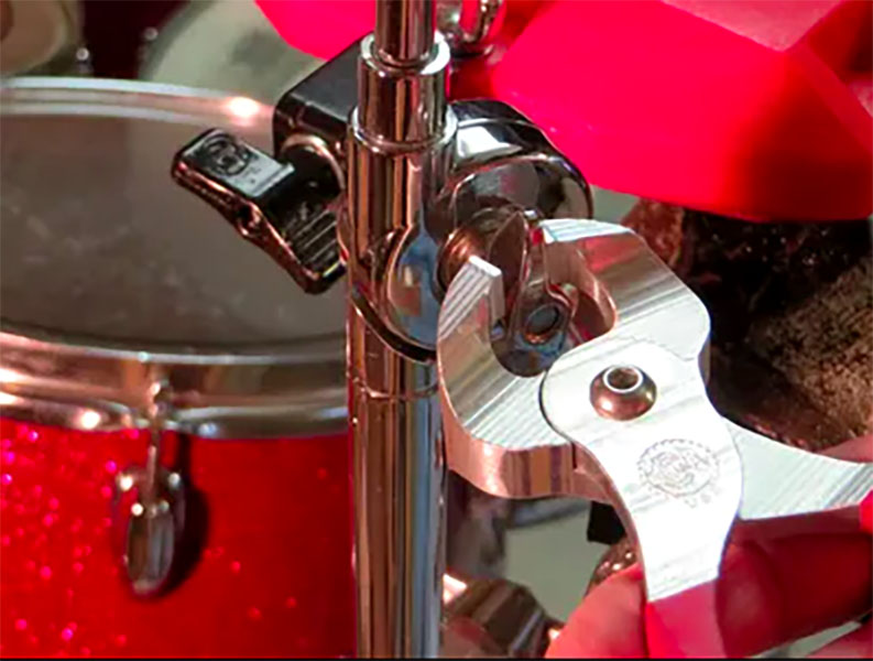 Berglund’s “Drummer’s Wing Nut Wrench” tightens a wing nut on a cymbal stand, accomplishing the task it was created to do. According to Berglund, “My tool has different uses, on my website I have a 101 uses section. It really could be used for so many things, and I’ve used it for so many things too.” Photo: CrabbyTools Website