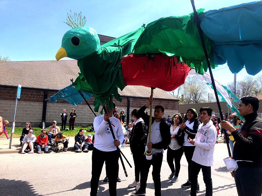 South HART students carry a giant puppet bird.