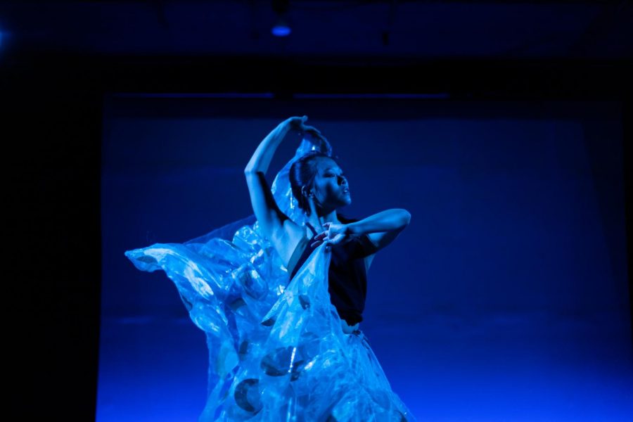 Nearing the end of the show, Julia Gay performs the serene Chinese peacock dance. As she moves and twirls, the dance just feels right: like an acknowledgment of grieving as well as a welcome to growth.