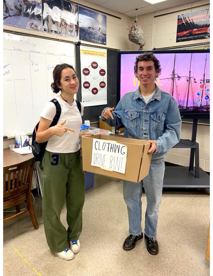 Juniors Ella Tennant and Miguel Gibneik setting up the winter drive donation box.